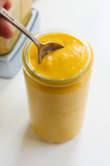 carrot ginger dressing in glass jar