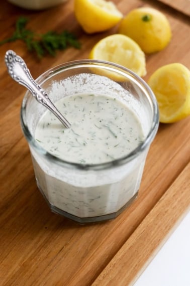 tahini dill dressing in glass jar